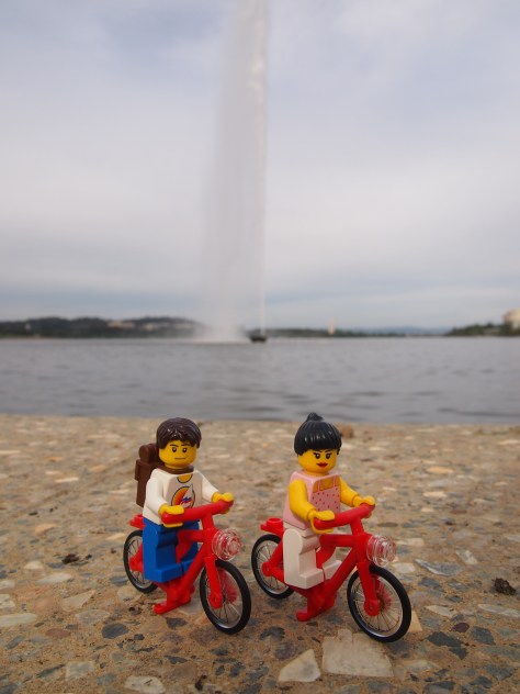 Cycling past Lake Burley Griffin and the Captain James Cook memorial fountain